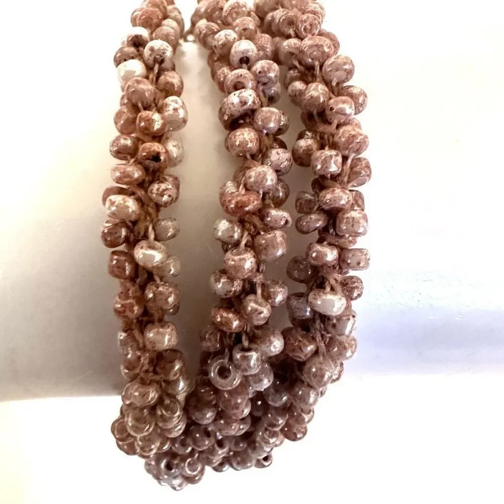 Triple strand seed beaded bracelet
